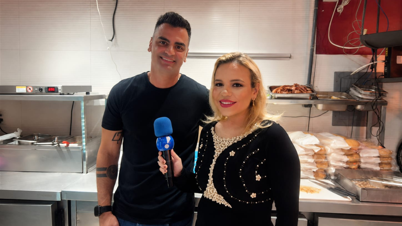 Filipe Valotto e a apresentadora Carol Camurugy